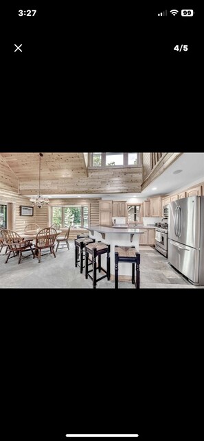 Private kitchen - Unique log cedar family vacation home with 185 feet of secluded lake frontage (Hale)