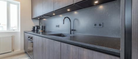 Deluxe Two Bedroom Apartment | Private kitchen