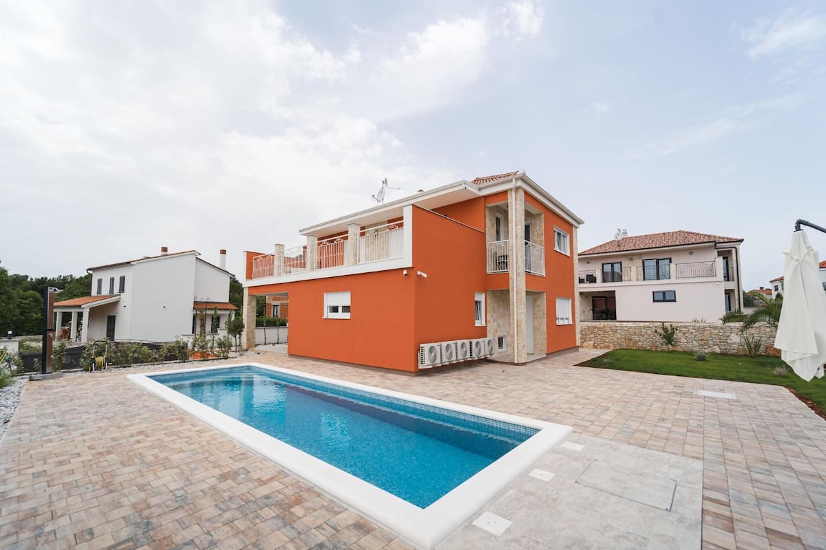 Villa (Four Bedroom Villa with Pool - South ) | Pool | Seasonal outdoor pool, pool umbrellas, pool loungers