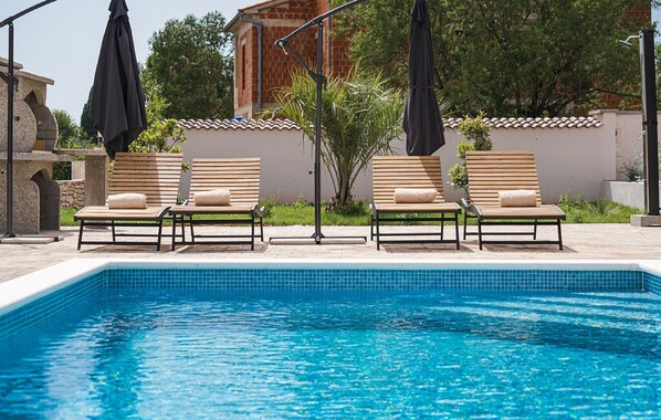 Villa (Four Bedroom Villa with Pool - West v) | Pool | Seasonal outdoor pool, pool umbrellas, pool loungers