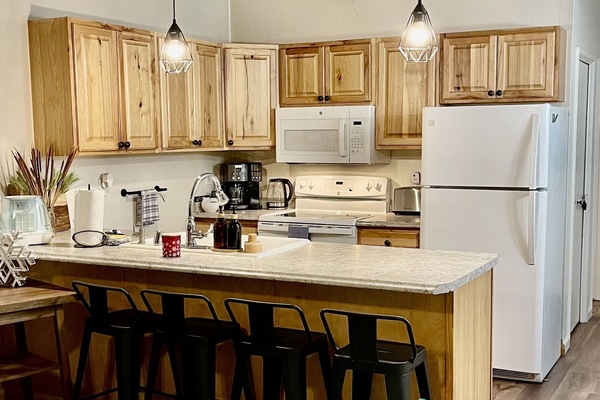 Frigorifero, microonde, forno, piano cottura