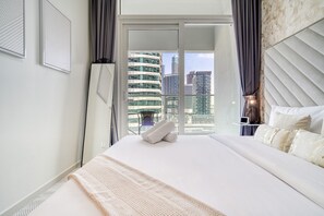 1 chambre, coffre-fort, fer et planche à repasser