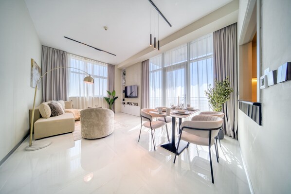 TV - Placid 1BR at Hamilton Residency Business Bay by Deluxe Holiday Homes (Dubai)