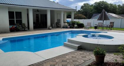 Gorgeous 5 bedroom home w/ pool. Close to Destin Beaches. No cleaning fee!