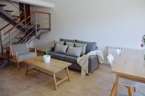 Dúplex Deluxe | Área de sala de estar | Smart TV 