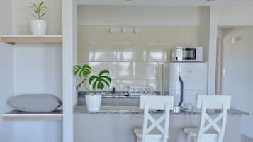 Deluxe Apartment | Living area | Smart TV