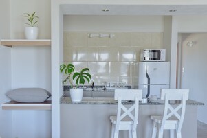 Deluxe Apartment | Living area | Smart TV