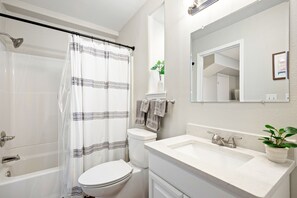 Hair dryer, towels, soap, shampoo