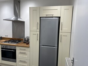 Apartment | Private kitchen | Fridge, microwave, oven, stovetop