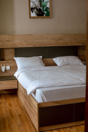 Premium bedding, desk, soundproofing, iron/ironing board