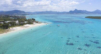 Bungalow Birds Paradise sur la Plage de Pointe D'esny, Pour Couples et Enfants