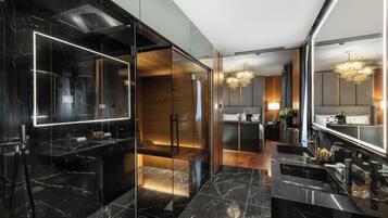 Designer toiletries, hair dryer, bathrobes, slippers