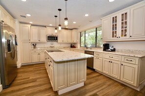 Coffee/tea maker, fridge, microwave, oven