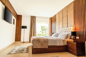 Deluxe Room | Bar mini, kalis bunyi, cadar katil 