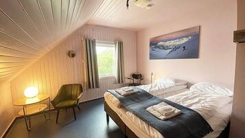 Rideaux occultants, fer et planche Ă repasser