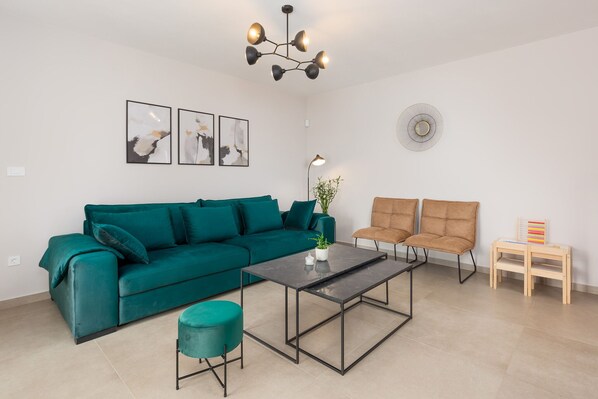 Smart TV, fireplace, table football, books