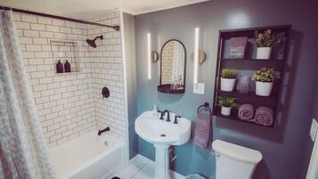 Hair dryer, towels, soap, shampoo