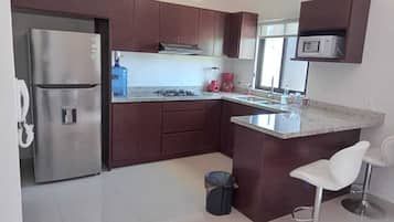 Microwave, coffee/tea maker, cookware/dishes/utensils