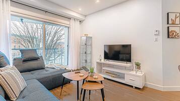 Appartement | Coin séjour | Télévision à écran plat de 40 pouces avec chaßnes numériques, Netflix