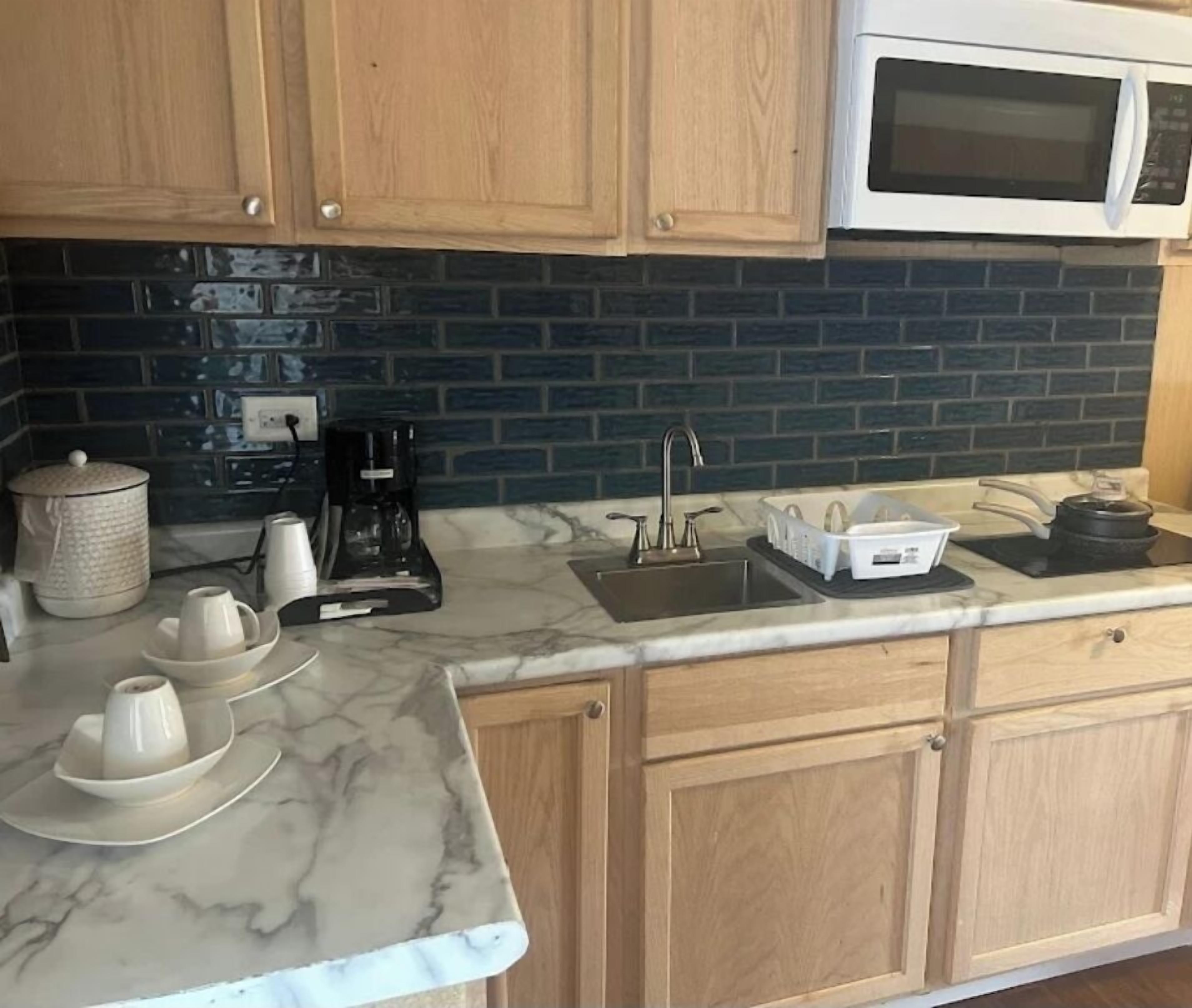 Signature Double Room | Private kitchen | Fridge, microwave, coffee/tea maker, freezer