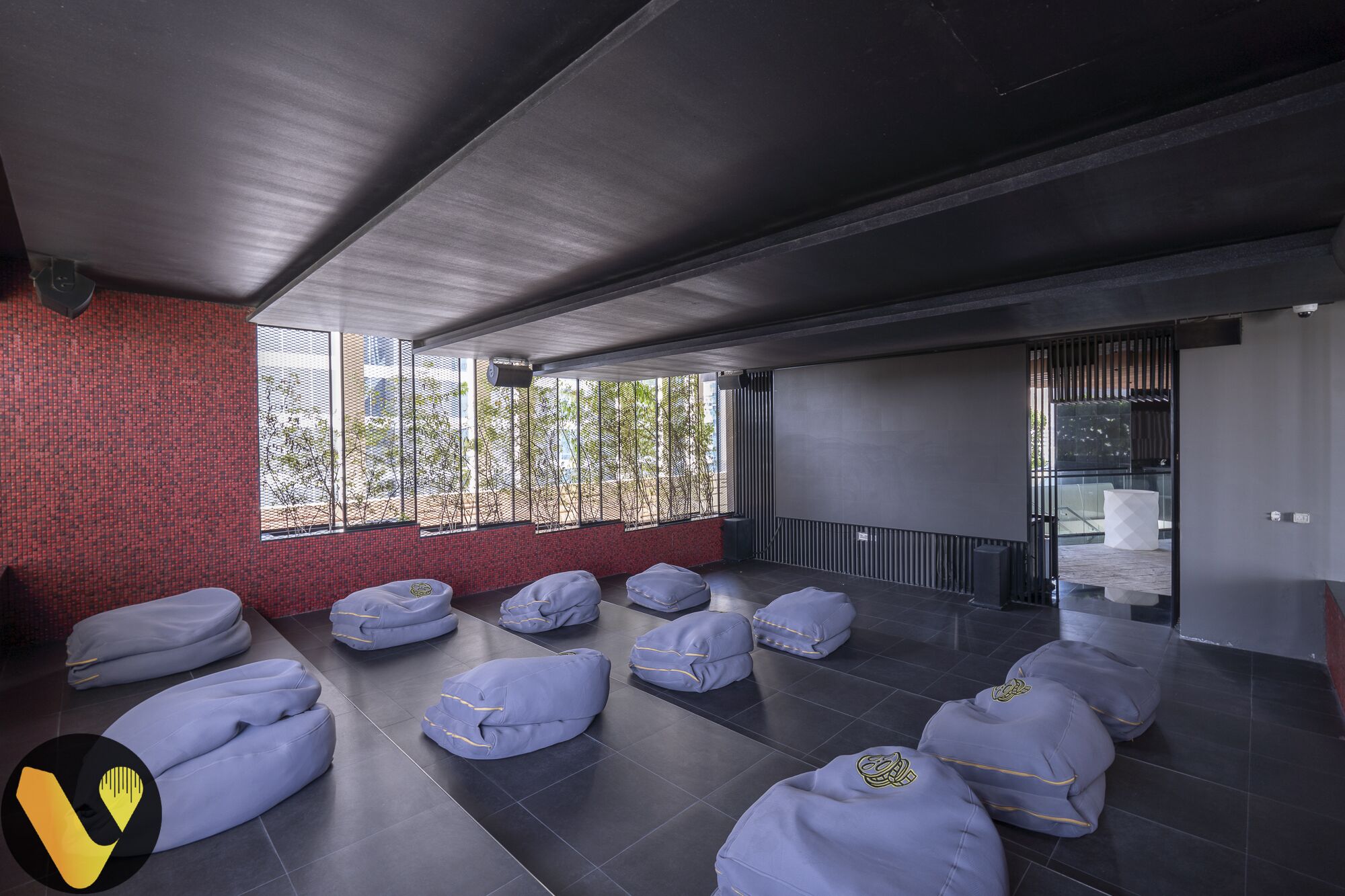 A modern spa room with multiple bean bags arranged for relaxation.