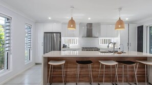 Coffee/tea maker, fridge, microwave, oven