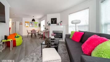 Smart TV, fireplace, books