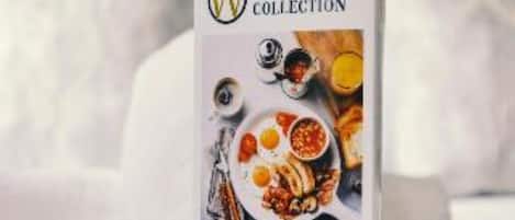 A book cover with the title 'Warren Collection' and a depiction of a meal.