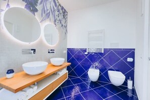Shower, free toiletries, hair dryer, bathrobes