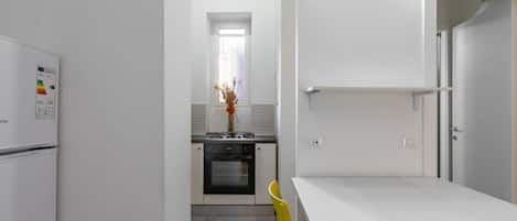 Refrigerador, horno, parrilla de estufa y tostadora