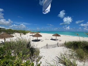 On the beach, sun loungers, beach towels - The Green Grouper, oversized beach villa. (Central Abaco , Treasure Cay)