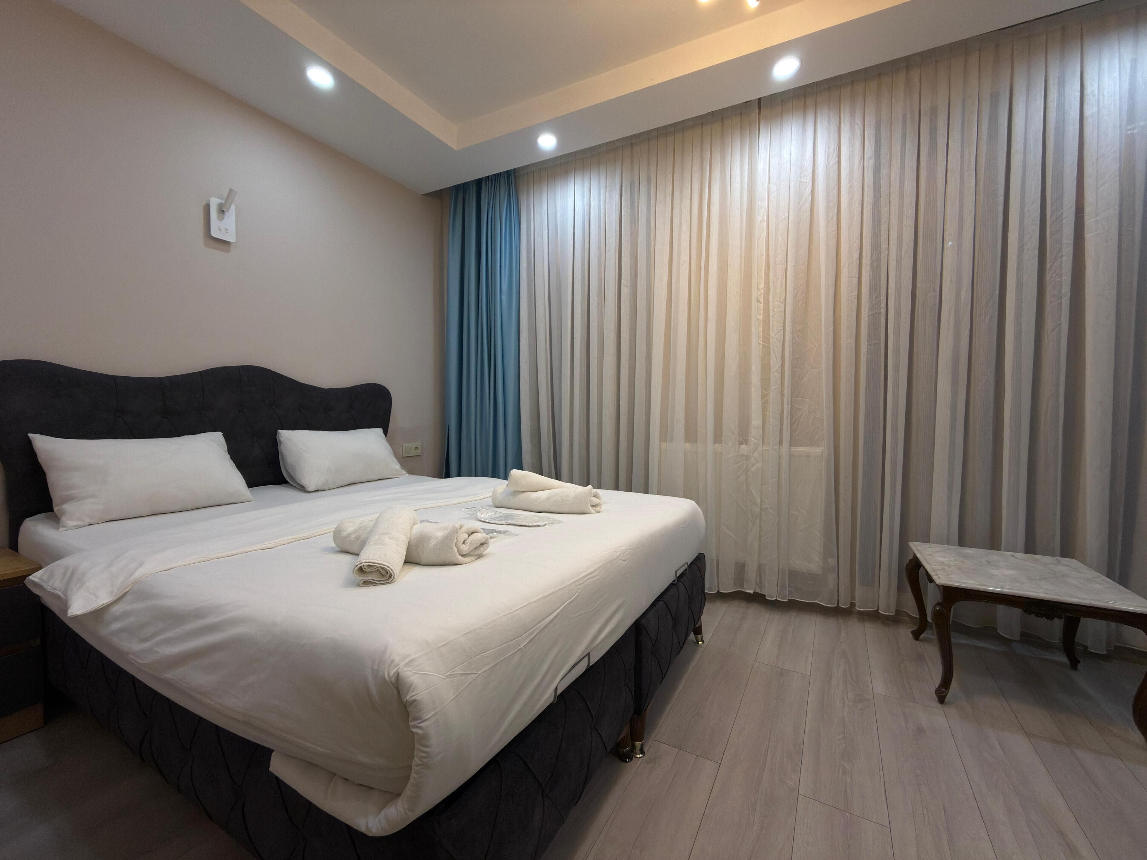 Habitació doble Deluxe, 1 llit doble | Llençols de cotó egipci, roba de llit d'alta qualitat i cobrellits 