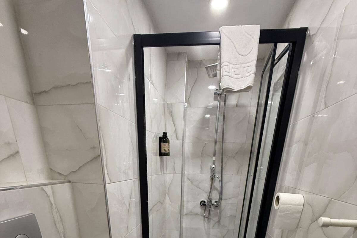 Economy Double Room, 1 Double Bed | Bathroom | Shower, rainfall showerhead, free toiletries, hair dryer