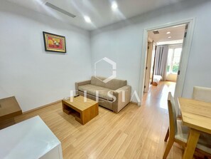 Apartment | Living area | Flat-screen TV - FLESTA Lê Thánh Tôn serviced apartment (Ho Chi Minh City)