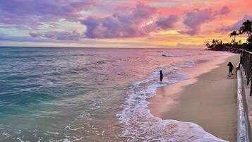 On the beach, sun loungers, beach towels