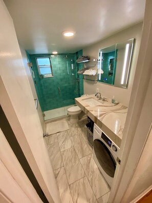 Hair dryer, bidet, towels, soap