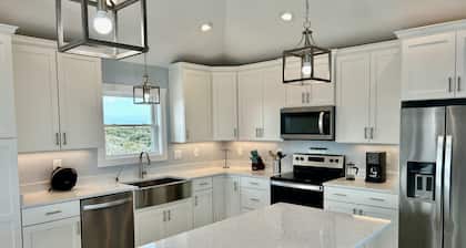 STEPS FROM THE WATER! BEAUTIFUL NEW HOME IN THE HEART OF 4x4 WILD HORSE CAROVA