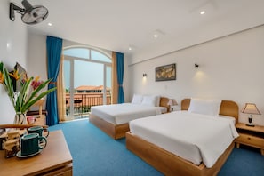 Habitación triple Deluxe | Servicio de la habitación