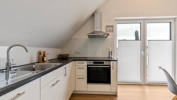 Réfrigérateur, four, plaque de cuisson, lave-vaisselle