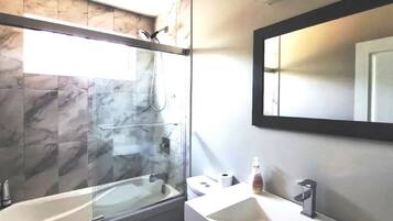Hair dryer, towels, soap, shampoo