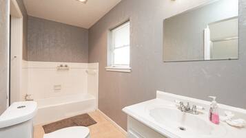 Hair dryer, towels, soap, shampoo