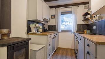 Family House, 2 Bedrooms (Alpine House Naturalina) | Private kitchen | Fridge, oven, stovetop, dishwasher