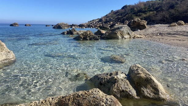 A rocky shoreline with clear water and distant islands. - Addauro Villa (Alcamo Marina)
