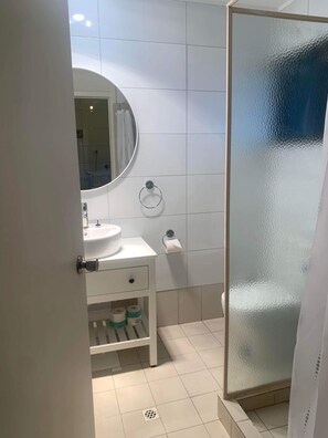 Shower, free toiletries, hair dryer, towels