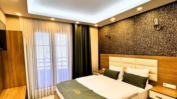 Premium Condo | Premium bedding, down comforters, in-room safe, individually decorated