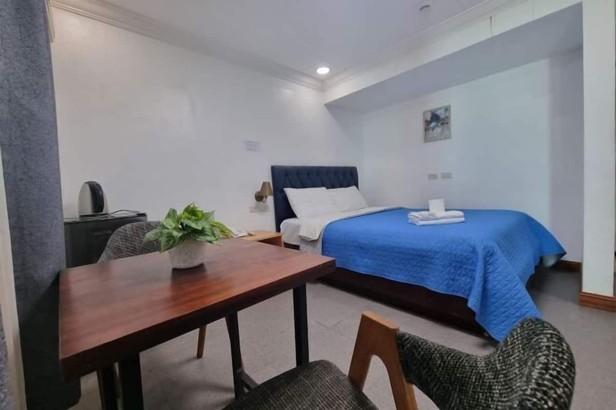 Desk, free WiFi, bed sheets