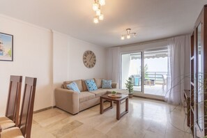 TV, fireplace - Apartamento Frentemar 1 by Costa CarpeDiem (Calpe)