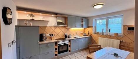 Fridge, oven, dishwasher, coffee/tea maker
