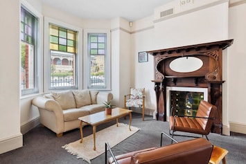 Unwind in the downstairs living room, designed with comfort in mind.