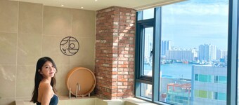Poolvilla in middle of city with a Busan Port view and Private Pool in room